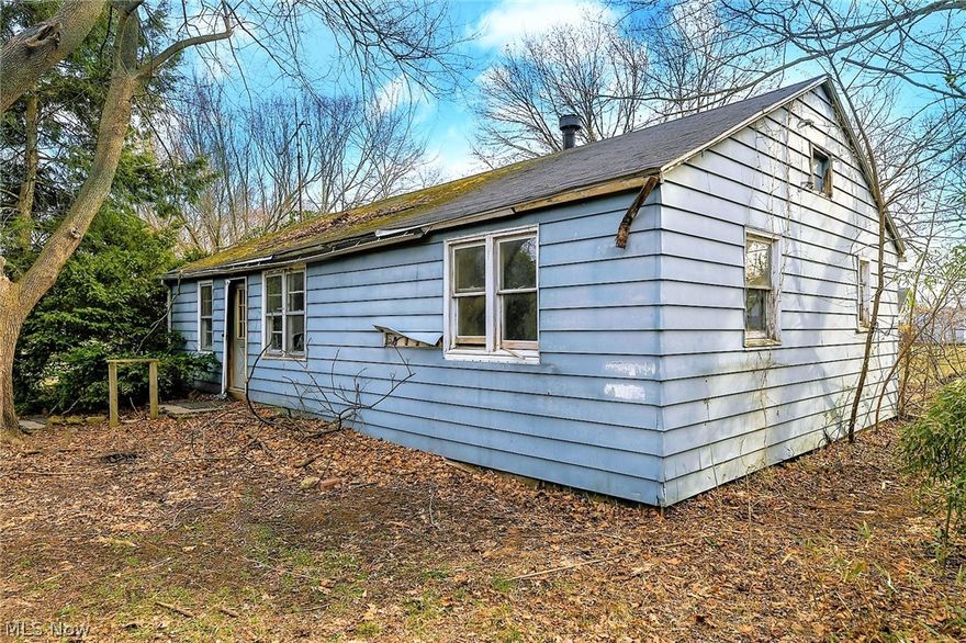 *Want To Be NEAR PORTAGE LAKES But Haven't Found What You Have Been Looking For? *BOATING, FISHING, KAYAKING, You Name It ALL Same Street *LONG LAKE Boat Ramp Is Right Here On Cove Blvd *How About A 3 Bedroom RANCH So Close That You Can Walk To The Lake? *How About Almost 3/4 Of An Acre & Beautiful Land That Allows You Room For Summer Cookouts Prior To Or After All Guests Hopping On A Boat Near Your Home & Going For A Ride On The Lake With You? *Everything You Need Is Here! *LOCATION SPECTACULAR! *Beautiful Land **HUGE 3 Car OVERSIZED Garage *Ranch Living *This Is A Diamond In The Rough ~ Investors Or HGTV Enthusiasts ~ Bring Your Vision! *Home & Garage In Need Of Repair, Salvaged And Beauty Brought Back To It. Blank Canvas. *Good Bones *Garage Concrete Floor And Brick Siding Would Make A Great Storage Place For Boats *Nicely Tree Lined On One Side For Privacy *Automated Value Model For Home In Future Great Condition Much Higher *CASH Buyers ONLY *Investors Or Owner Occupied Allowed -