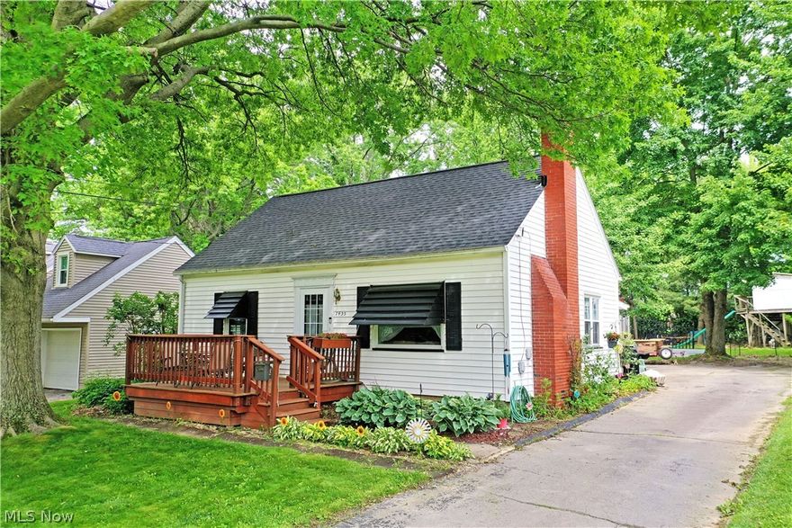 Your home for the summer and more just arrived today! This darling Boardman Cape Cod is brimming with style and potential alike as it presents a variety of highly desirable qualities both inside and out. The prime location residence finds itself in a quiet neighborhood, just moments away from some of the area’s premiere shopping and dining districts. Veiled in the natural privacy of tall trees, the charmer peers out to present its impressive, raised front patio area; a perfect place for warm weather relaxation. The cement driveway wraps around to find both a window lined rear sunroom and an oversized, two-car garage for secure storage. Further into the yard, a fenced-in area finds a child friendly treehouse. Meanwhile, find your green thumb within the grow-ready greenhouse and accompanying outdoor garden area. Through the front door, a welcoming living room brings you inside, setting the tone for comfort. Around the corner, find the window lined dining space that transitions into the gracious kitchen with its bright white appliances and tiled backsplash. Completing the first floor, a pair of spacious bedrooms join a brightly lit full bath. Upstairs, the landing splits off to find a large storage area; an easy nursery or office space. The third, loft bedroom opens to reveal its sizeable footprint, completing the floor. Laundry and storage are found at the basement level.