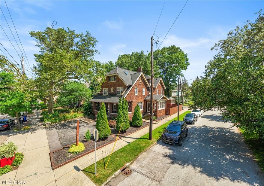 Welcome to 12404 Larchmere Avenue—a rare, all-brick duplex on a prominent corner lot in the heart of Cleveland’s vibrant and historic Larchmere District. This exceptional property blends classic architectural charm with modern updates and proven income potential, currently operating as a fully functional Airbnb.

The spacious front unit offers four generously sized bedrooms, a beautifully updated kitchen with granite countertops and upgraded appliances, and timeless character showcased through original built-ins and expansive windows that flood the home with natural light. Enjoy relaxing mornings or evenings on the covered front porch. The basement adds even more flexibility with a full bathroom and additional usable space, while convenient front parking enhances accessibility.

The rear unit features its own private entrance and a thoughtfully designed layout, including an updated kitchen, living room, and dining room. Upstairs, the primary bedroom opens to a private balcony, complemented by an additional bedroom. The walkout basement expands the living possibilities with a bedroom and kitchenette—ideal for guests or extended stays. Step outside to enjoy the attached deck, perfect for entertaining or quiet relaxation.

The property also includes an attached garage and a backyard retreat with an additional outdoor living space, offering multiple areas to unwind or host. Located just steps from the shops, restaurants, and cultural charm of Larchmere, and minutes from Shaker Square, this property offers unmatched convenience. World-class healthcare at Cleveland Clinic and University Hospitals is just a short 5-minute drive away.  Whether you’re an investor seeking strong short-term rental income or an owner-occupant looking for versatility and location, this unique duplex delivers opportunity, character, and lifestyle all in one. Furniture is negotiable.  Schedule showings around bookings.
