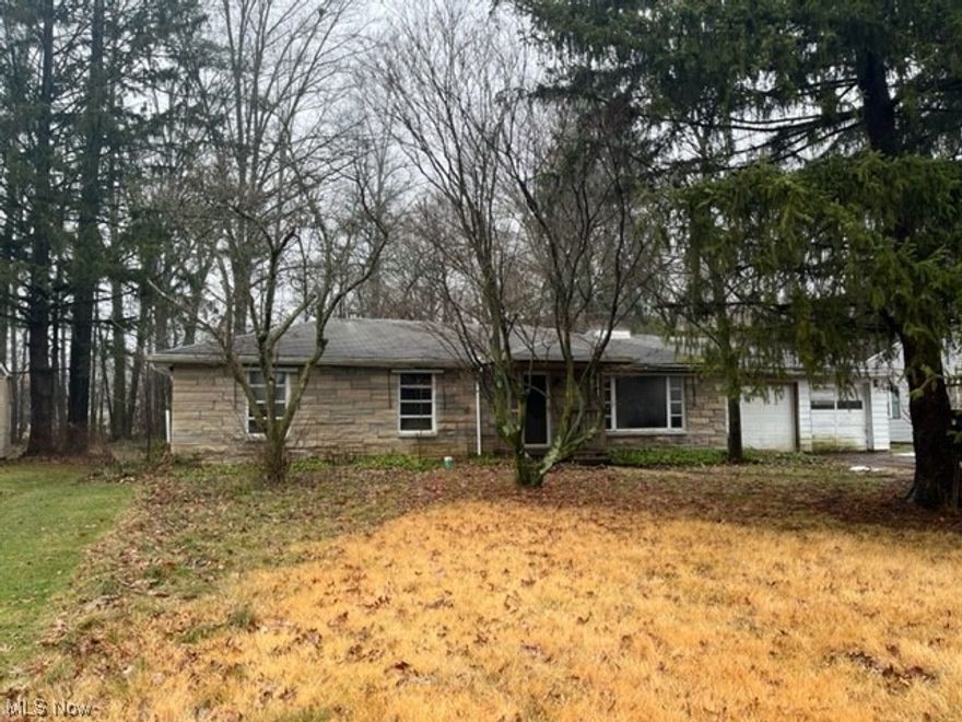 Attention investors. Home is in need of a make over. Can possibly become a 4 bedroom by adding a door to den opening that has an attached full bathroom already. Large eat-in kitchen with plenty of daylight. Home has good sized rooms, 2 full bathrooms and backs up to the woods. Home is being sold As-Is. Bring your touches and make this home shine.