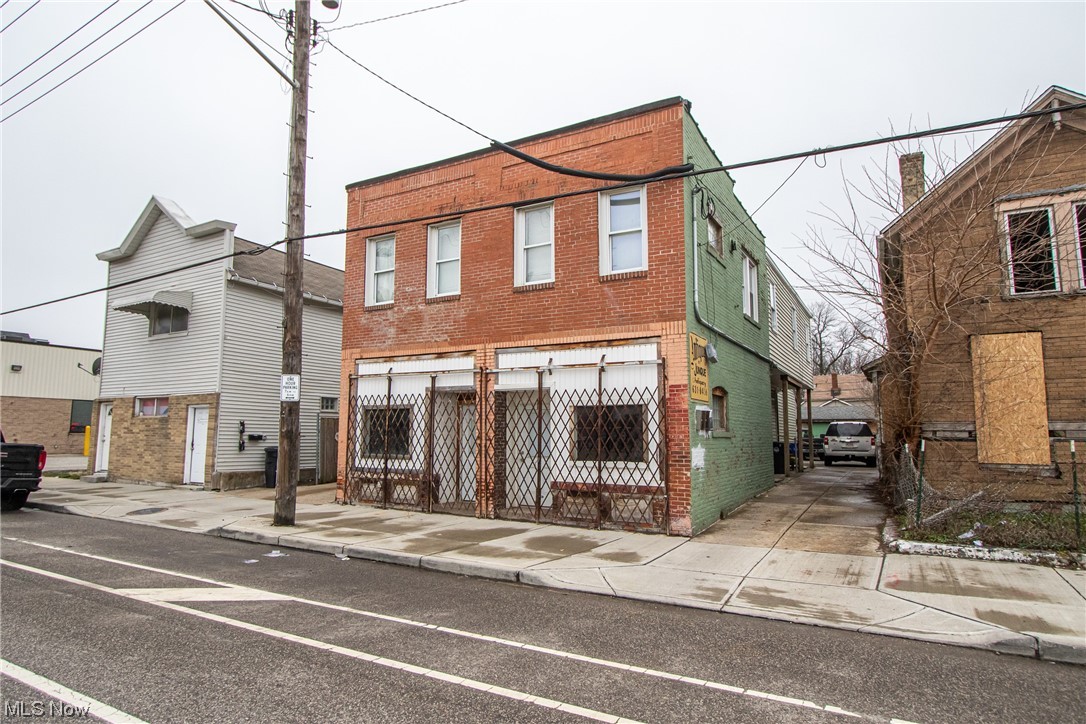 Turnkey, all redone mixed use cash cow grossing $3,600 per month, located on the redeveloping Lorain Ave corridor! Four total units including a retail store front with $1,000 in potential rent along with all occupied (3) residential units that include two spacious two-bedroom units rented at $900 each (back down/ back up) and a nice sized one-bedroom unit rented at $800 (up front). Recent upgrades all took place in 2020 and 2021 including all plumbing feed lines/ drains, electrical panels, service lines/ new wires, furnace for down units, drywall and all finishes, rubber roof, vinyl siding, vinyl windows and more! A must see.