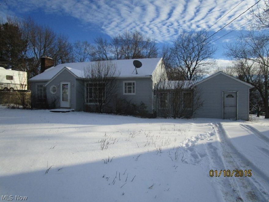 Sprawling ranch-style home with basement in Springfield area of Akron. Lots of land to expand! Features include 2 bedrooms, 2 full baths in over 1288 sq.ft. of living space. Living room with picture window and fireplace. Dining room area. Kitchen is light & bright with secondary door and casual eat-in area. Good-sized bedrooms! 1-car attached garage. Huge back yard with lots of potential! Close to most shops, schools and parks. All offers must be submitted with pre-approval letter or proof of funds. Employees or family members residing with employees of Bank of America, N.A., its affiliates and subsidiairies are strictly prohibited from purchasing any property owned by Bank of America, N.A.