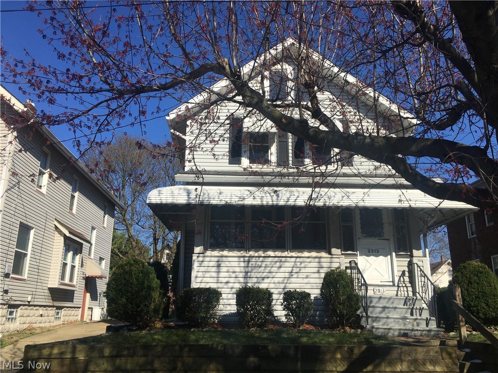 Well maintained home in heart of Kenmore. New carpet and freshy painted throughout! Roof, hot water tank windows all around ten years old. Enjoy the enclosed screened in porch with surround awning and freshy painted flooring. The living room and dining area have decorative wood trim in good condition, bay window in dining area, and eat in kitchen (stove not included in sale). New LED lighting and upgraded cabinets in kitchen. Ceiling fans throughout home but also equipped with central air, and a house humidifier (Aprilaire). Third floor bonus room with nice big windows could be used for office, play room, studio, or storage. The basement has been waterproofed with a warranty. Sump pump includes back up battery. half bath in basement. Location close to Boulevard park, the expressway entrance, convenient market, and public transportation.