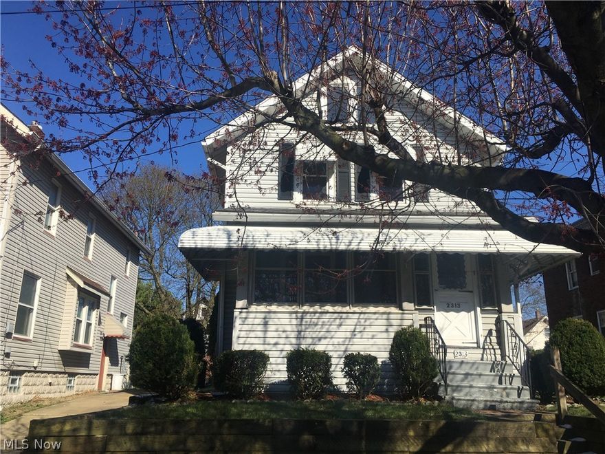 Well maintained home in heart of Kenmore. New carpet and freshy painted throughout! Roof, hot water tank windows all around ten years old. Enjoy the enclosed screened in porch with surround awning and freshy painted flooring. The living room and dining area have decorative wood trim in good condition, bay window in dining area, and eat in kitchen (stove not included in sale). New LED lighting and upgraded cabinets in kitchen. Ceiling fans throughout home but also equipped with central air, and a house humidifier (Aprilaire). Third floor bonus room with nice big windows could be used for office, play room, studio, or storage. The basement has been waterproofed with a warranty. Sump pump includes back up battery. half bath in basement.  Location close to Boulevard park, the expressway entrance, convenient market, and public transportation.