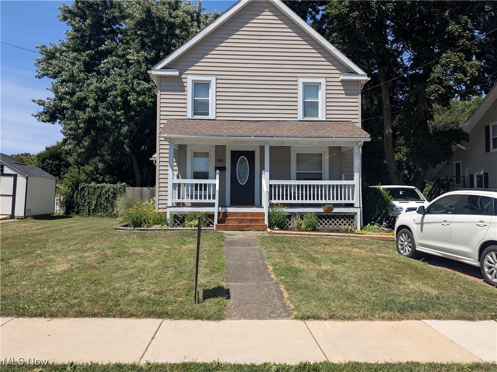 Warm inviting Colional in the heart of Mogadore village. Prime location. Walking distance to many amenities. Covered front porch. Rear deck. Large country kitchen with lots of cupboards. . formal dining room. Half bath on first floor. Many updates. Newer windows throughout. New proch roof.. Vinyl siding 2015. New hotwater heater. Flooring on first floor 5 years old. New electric box. Don't miss this one.