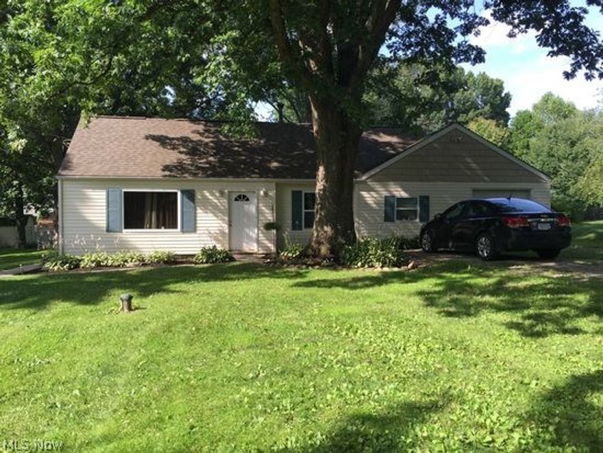 Ready to claim your little bit of paradise? This home is move-in ready with many updates. Enjoy the spacious treed yard, great for entertaining, relaxing and enjoying outside activities (.6+ acres, 2 parcels). 3 bedrooms and laundry room are on the first floor. Recent updates include remodeled bathroom with shower, newer carpeting throughout and kitchen appliances. In 2009-2010 a multitude of updates brought this 1948 Cape Cod into the 21st Century! A total rehab included roof, garage door and opener, windows, water supply lines (PEX), vinyl siding, well pump, furnace, drywall, ceramic tile, counter tops, ceiling fans, gutters, downspouts, well pressure tank, wiring, ductwork and more! Conveniently located near Portage Lakes State Park and the Ohio & Erie Canal Towpath Trail. A short drive to State Route 21 and I-77. Home warranty included. See it today!