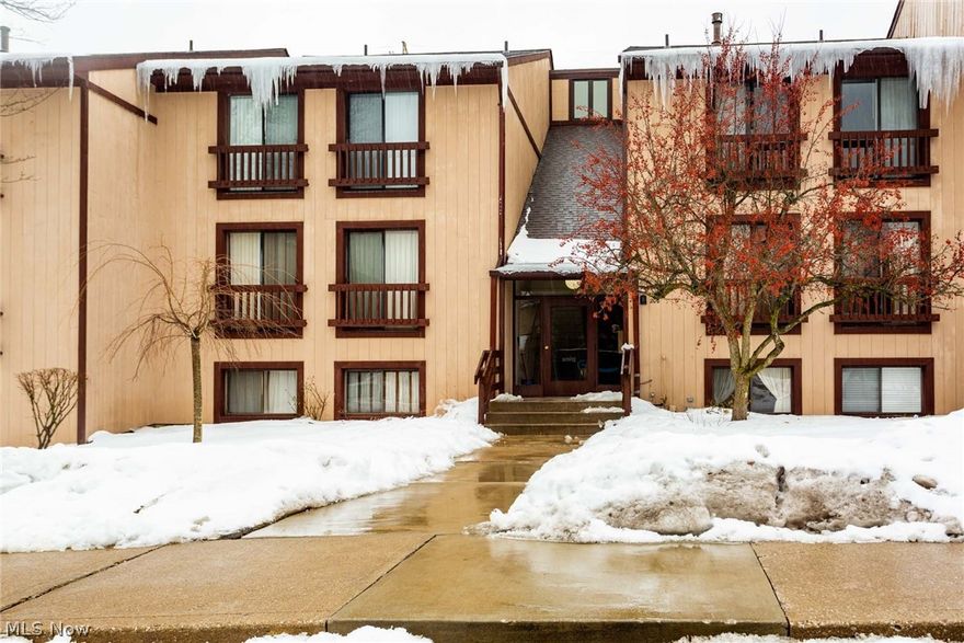 Enjoy One-Floor living in the this second story unit with two bedrooms and two full baths! Enjoy the view with your morning coffee on the covered balcony. facing wooded views.  The oversized sliding glass door in the family room, provides a ton of natural light!  Activities to do; bike trails, tennis courts, Lake and Club House to name a few! Kitchen was updated in the past few years, and freshly painted throughout.   - A Must See!