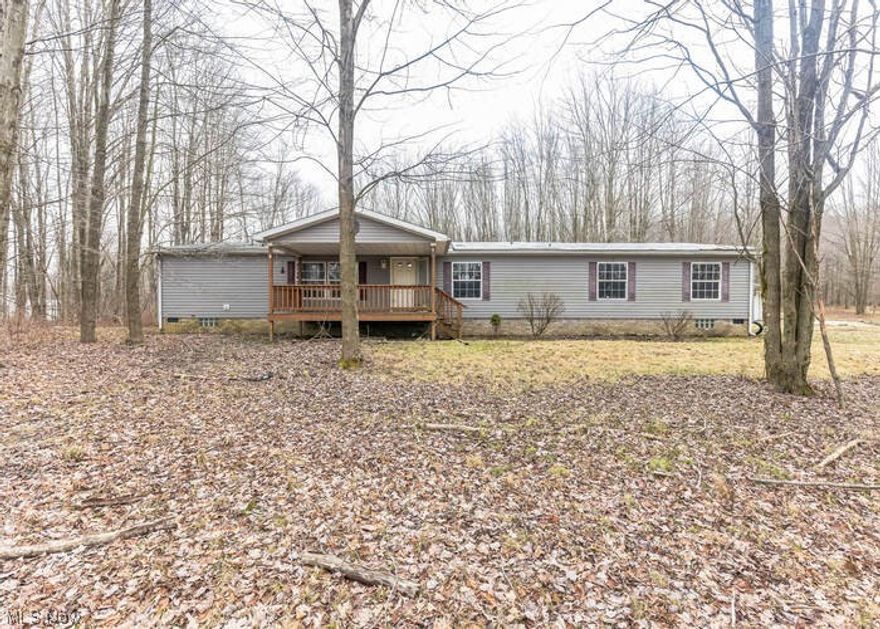 Great opportunity to buy this ranch style manufactured home built in 2002, located in Monroe Township near Conneaut, OH and sitting on over 6.6 acres with a detached 3 car garage. The interior has 2560 sq. ft. with 4 bedrooms and 3 bathrooms, living room, den, kitchen and dining area.