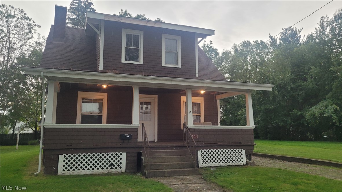 Traditional Style 2 Story with spacious rooms. Wood floors and wood trim accent this lovely home. A covered porch greets you as you approach the front door. Once inside you are in a 23x11 living room complete with wood burning fireplace. The kitchen and dining room compliment the rest of the main floor space. Upstairs are the bedrooms and full bath along with the attic access. The basement is full sized and unfinished. Outside is a detached 1 car garage and a large 14 x 20 concrete block outbuilding.