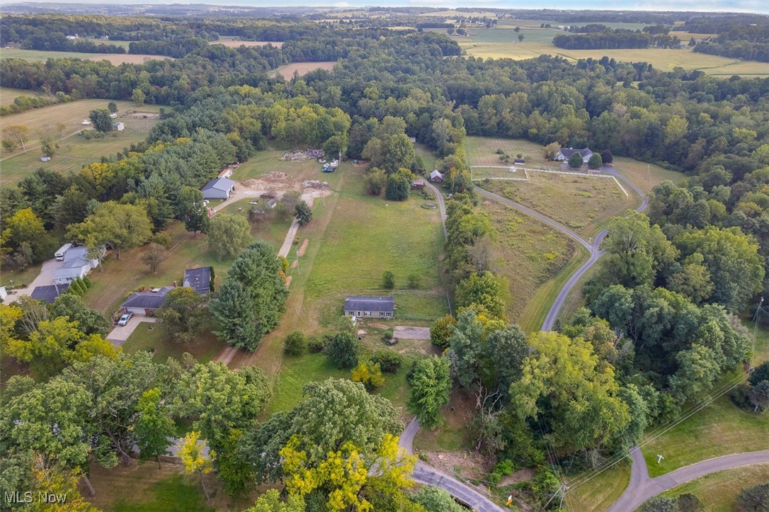 Wayne County Real Estate Opportunity. 6 Acres, Future Homesite, Modular Home & Rustic Cabin. Excellent Location Between Wooster & Apple Creek. East Union Twp., Wayne Co., Waynedale Schools. Live Auction with Online Bidding Available on Real Estate. ABSOLUTE AUCTION, all sells to the highest bidders on location. ONLINE BIDDING BEGINS SATURDAY, SEPTEMBER 27, 2025, at 12:00 PM, and AUCTION LIVE ON-SITE BIDDING WILL BEGIN TUESDAY, SEPTEMBER 30, 2025, at 4:30 PM - REAL ESTATE SELLS AT 5:00 PM. 6 acres of land in a prime location between Wooster and Apple Creek. Great location for a future homesite. The modular home, rustic cabin, and outbuildings are all in need of repair or removal. The mobile home in the back is not owned by the seller, and the tenant pays monthly lot rent. Great opportunity for sweat equity, future homesite, or family compound. Wayne Co. parcel #:27-00369.000. Half-year taxes are $1,665.