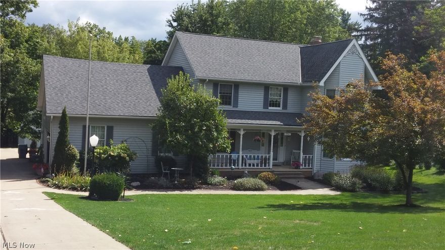 Looking for a newer home but not the "development" people? Then you must see this pampered colonial on a serene 1.5 acre lot in a premier location. This beautiful colonial features 4 bedrooms, 3 full and 1 half baths, family room and finished walk-out basement. In addition to all this space there is a ready to finish space on the second story of 440 sq ft. (insulated, heat ducts, done) The two story foyer with oak staircase leads you to either the formal living room or dining room featuring gleaming hardwood floors and a trayed ceiling. Kitchen has plenty of oak cabinetry and granite counter tops with built in stainless steel appliances on ceramic floor. The dinette features beautiful hardwood flooring and flows right into the homey, warm inviting family room with a wood burning fireplace.  1st floor laundry room rounds out the first.  A huge master bedroom with vaulted ceilings awaits you with you own private bath with soak tub, large shower and a relaxing atmosphere.  There are 3 gen