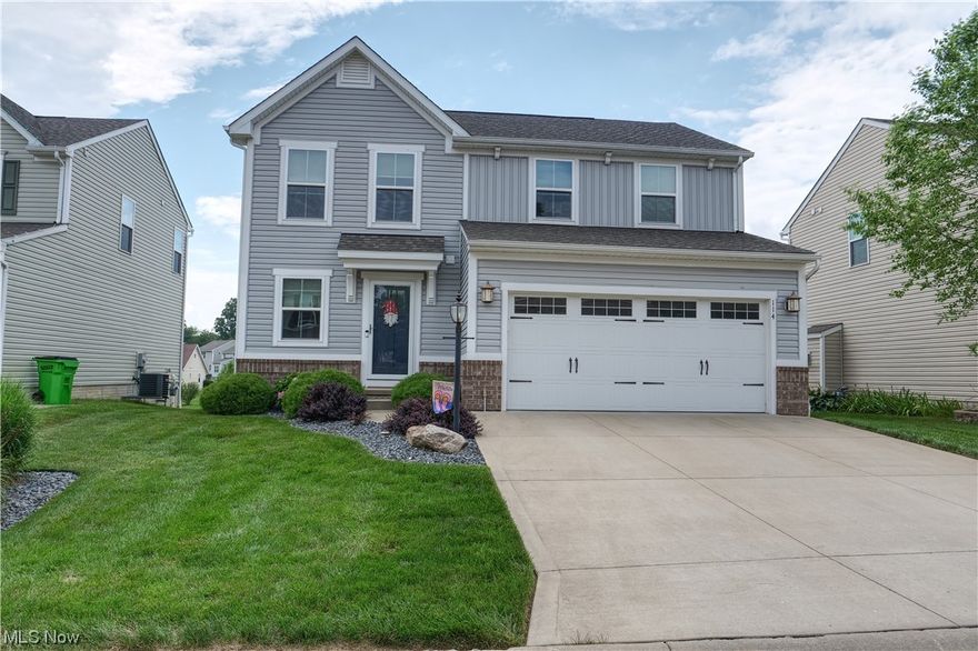 Welcome to 114 Northwood Ln this three-bedroom, two-and-a-half bath, second-floor laundry colonial is located in the Eastwood Glen development in the Tallmadge school district. Arriving at the property, you will notice plenty of curb appeal from the landscaping all around to the oversized driveway leading to the decorative modern two-car garage that offers water and drains for the vehicles. The front door entered offers an upgraded overhang keeping guts and packages dry. First floor half bath off the foyer, then leading to the family room and an entry foyer way off the garage. The family room over looking the back deck and patio, offers an upgraded rock gas fireplace on a switch keeping it cozy in those winter months. Can lighting throughout the open floor plan leading to the remodeled kitchen with oversized granite island and sitting area. The kitchen offers granite countertops, a backsplash, a Frigidaire refrigerator with water and icemaker, stainless steel GE stove microwave, a dishwasher, and a large pantry. Extension off back of home for the fanned breakfast room leading to the back deck and concrete patio great for entertaining. Upstairs offers three bedrooms, two full baths granite as well, and an oversized second-floor laundry room. Large master with plenty of room for seating and bedroom set, walk-in closet, and master bath. The basement is an unfished blank canvas. Set up your private showing today.
