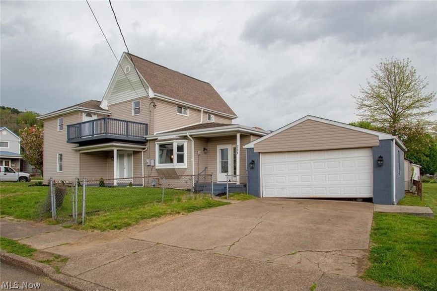 SHADYSIDE!! JUST HIT THE MARKET!! You will definitely want to be among the first to view this COMPETELY UPDATED & REMODELED home. With 4 SPACIOUS bedrooms, 2 full bathrooms, and OVER 2500 SF of living space, there is room for everyone! The GORGEOUS kitchen features an eat at island, modern white cabinetry and an open view of the FABULOUS living room hosting a warm and inviting fireplace! LARGE closets along with BEAUTIFUL wood, carpet and tile flooring throughout. The bedrooms (and 1 full bathroom) are on the 2nd level with one having a walk out deck to enjoy those great summer nights. First floor laundry. LOTS of entertaining space on the front and side covered porches, PLUS... the HUGE open deck at the rear of this completely fenced in home! The basement offers so much storage space along with a workshop area. This property also includes a 2 car detached garage. CALL TODAY!!