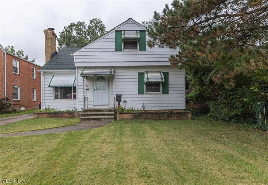 Garfield Cape Cod With 1502 Square Feet! Eat-In Kitchen With Plenty Of Counter and Cabinet Space. Spacious Living Room Features Brick Fireplace and Hardwood Flooring! Two Bedrooms On Main Floor With Large Second Floor Dormer That Could Be Master Or Teen Suite! Full Basement Provides Plenty Of Square Footage and Has Half Bath. Enclosed Back Porch (2020) Perfect For Relaxing. New Electric Panel and Newer Air Conditioning (2020). Great Location, Close To Shopping and Freeway Access.