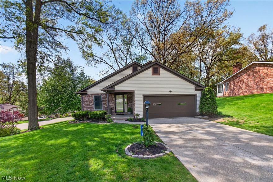 Beautiful multi-generational home situated on a quiet corner lot just minutes from a direct entrance to Sippo Lake Park and its scenic walking trails. This spacious 4-bedroom, 2.5-bath home offers 2,079 square feet above grade, plus an additional 1,000 square feet in the finished walk-out basement — ideal for a potential in-law suite, nanny quarters, or private living space.Fresh professional paint and new carpet throughout make this home truly move-in ready. The thoughtfully designed main level includes two bedrooms and a convenient first-floor laundry. The primary suite features a private ensuite bath and a walk-in closet with custom built-ins. The well-equipped kitchen offers abundant pantry space and quality KraftMaid cabinetry, complete with built-in conveniences, including a cutting board, spice rack, Lazy Susan, and breadbox. Enjoy the outdoors year-round in the bright and airy sunroom that opens to a spacious patio, perfect for entertaining or relaxing. Major updates include new HVAC systems installed in 2023 and 2024. The lower-level kitchen comes fully equipped with a refrigerator, stove, microwave, and dishwasher, adding even more flexibility for extended living arrangements. The unfinished portion of the basement provides generous storage space or potential for an additional bedroom.