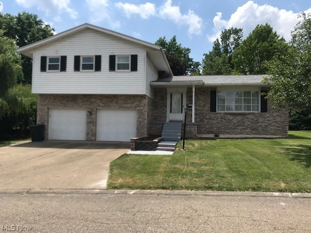 Roam to roam in this great 4 bedroom 2.5 bathroom multi-level home. Located on a quiet cul-de-sac street with a park-like backyard. Enjoy the covered patio area for BBQs and family gatherings rain or shine! Inside you will find 3 large living areas on 3 levels. There is a living room on the main level, a family room on the lower level, and the basement features a half bath, bar area, and family room complete with a nice wood-burning fireplace. The 4 bedrooms are on the second level and the master has a spacious walk-in closet. The updated home is clean and move-in ready. Owners do not own mineral, gas, and oil rights. BETTER HURRY!