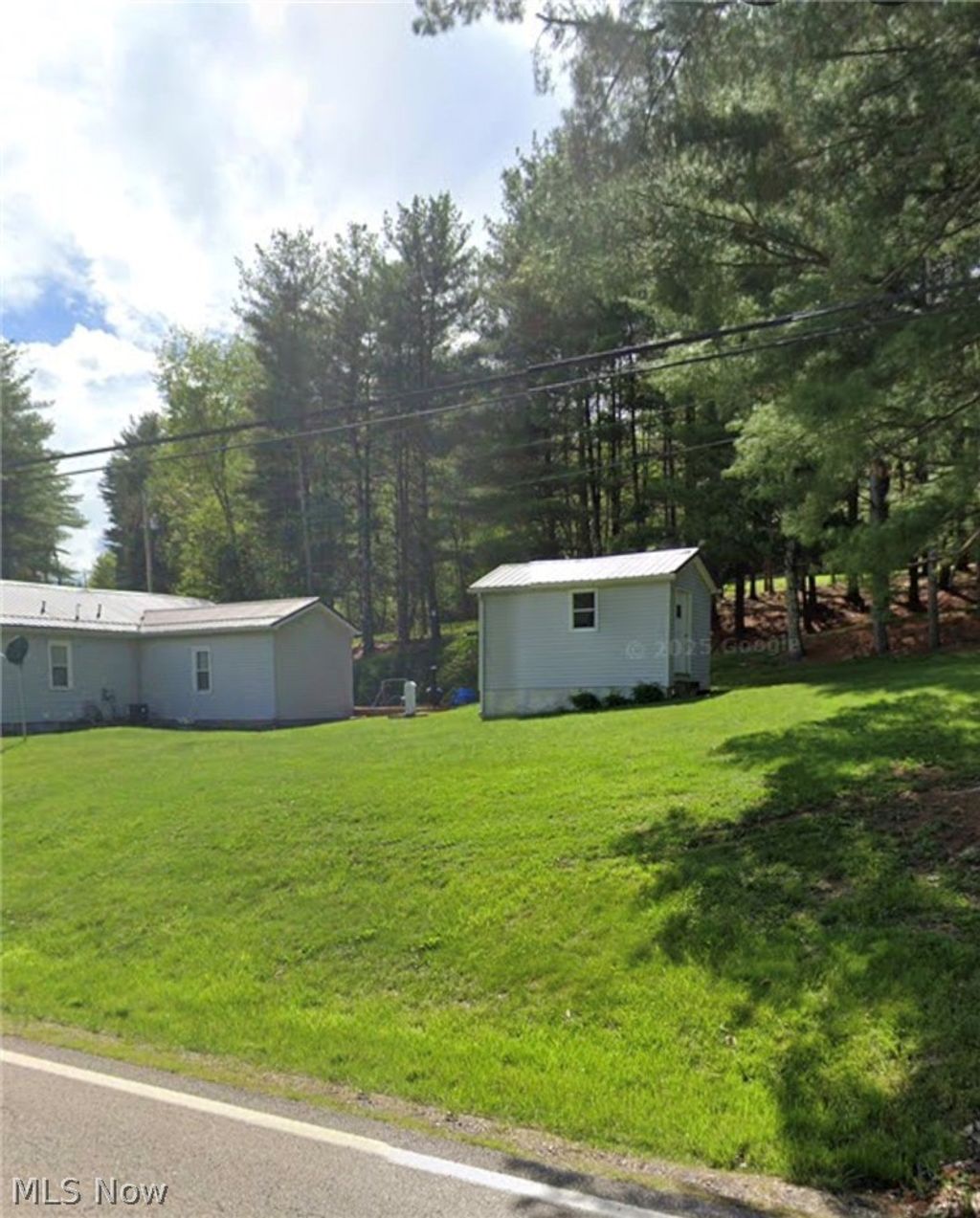 Photo of 47155 Sarahsville Road, Caldwell, OH 43724 (MLS # 5212716)