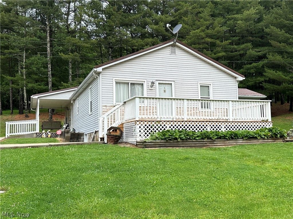 Photo of 47155 Sarahsville Road, Caldwell, OH 43724 (MLS # 5212716)