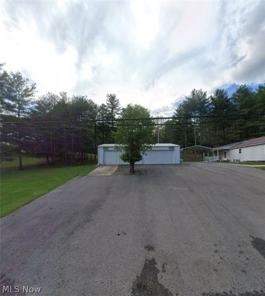 Photo of 47155 Sarahsville Road, Caldwell, OH 43724 (MLS # 5212716)