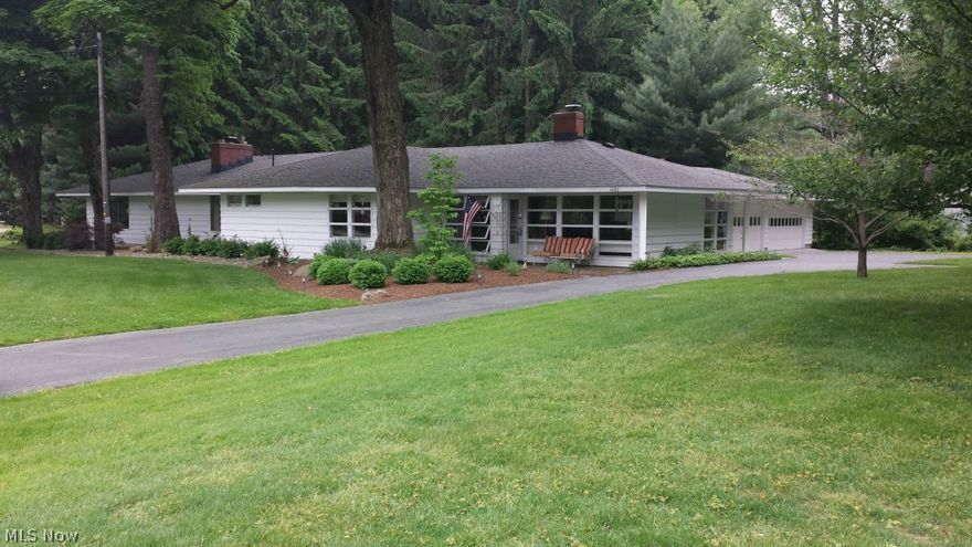 Gorgeous sprawling Ranch home with 2 separate areas of living space ideal for entertaining or house guests or multigenerational Owners; 4 bedrooms (one is used as a sitting room currently) with 3 bathrooms, 2 large living rooms with 2 fireplaces, separate dining rooms, pool room & big nicely painted basement level. This home has several heat sources, 2 fireplaces, In-Ground Pool, 4 stall garage, view of lake across the street between the neighbors; highly sought after Twin Lakes of Franklin Township wit Kent City Schools; HOA has private lake usage (East and West Twin Lakes) as well as Beach with Beach house, docks, kayaking, canoes, fishing & non motorized boats allowed with HOA. Come see this beautiful loved home! Sellers relocating for career move have completely renovated all the bathrooms, added proper insulation, & many upgrades for future Buyer to benefit! Home Warranty with Listing for peace of mind! Short drive to Kent State University & only 35 minutes to CLE or CAK Airports