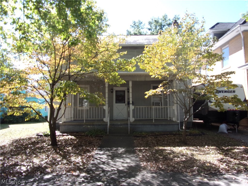 Lot goes to alley behind house with garage off of alley. 2 bedrooms upstairs, first floor bedroom and full bath.
#1002