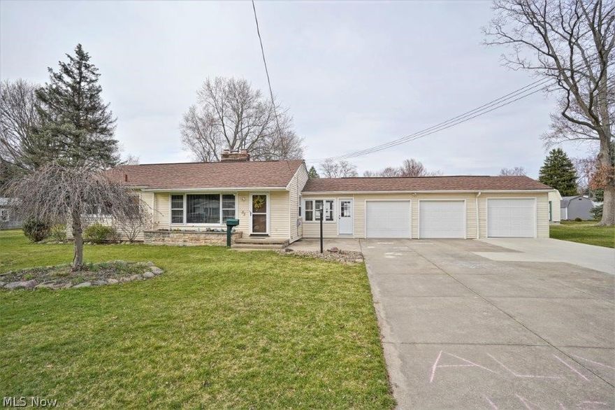 Updated Tallmadge ranch with a great yard! Home features 3 large bedrooms, 1.5 baths and a finished basement! 
The 3 car garage offers room for cars, lawn tools or just additional storage. The driveway is a dream for additional parking.
Enjoy mornings on your covered patio overlooking your back yard!