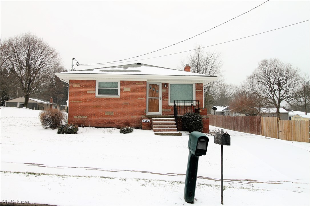 Precious memories begin right here in this extremely clean brick ranch, which is the perfect home if you want turnkey and move-in ready. Almost every surface has been replaced or updated. There is plenty of kitchen counter space and maximum light from the large picture window and update light fixtures, new vinyl flooring. Custom window treatments are throughout the home and the bathroom has been fully remodeled. New carpeting in the living room, dining room and hallway. The full basement has additional cabinets and shelving units for maximum storage capacity and organization. There is a one car detached brick garage and the exterior is updated with aluminum porch railings, new front steps, and freshly painted trim. All landscaping has been well maintained. The backyard offers space where you can entertain, or just enjoy. So many updates include: house and garage roof replaced in (2012), furnace and A/C (2004), hot water tank (2012), updated electric panel with at least one grounded out