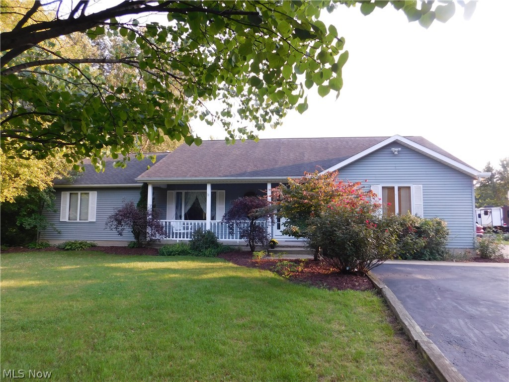 This beautiful Ranch with a country setting on 3.6 acres has everything you need for the extended family. Drive down the 200 ft+ tree lined driveway to your new home with a In-Law suite or home office with separate entrance. Horses/livestock are permitted. Seller just installed a new furnace. Upon entering the home you will be warmed by the custom hardwood floors, open floor plan, a spacious kitchen, w/ french doors to the great room, a first floor laundry room, over-sized bedrooms with walk-in closets and a 20x14 master suite with full bath. Over 2800 sgft on the first floor and additional 2300+ sgft in the finished basement with a family/media rm and gas fireplace, surround sound wiring and pool table. There is also a rec-room with a wet bar/kitchenette, full bath, office space, workshop/utility room and two additional bonus rooms that could bedrooms, dens or customize to your needs. The In-Law Suite is handicap modified with over-sized pocket doors, a kitchen, living room, bedrm and full bath. Run your business from home, covert the suite to a office space with a waiting area, private office and meeting space features additional heat and A/C to keep the suite comfortable all year round. The deck surrounds a pool with a beautiful view of yard. There is fenced area for pets, gardens & kids. All the appliances stay in main house and In-Law Suite. The home offers several updates!!