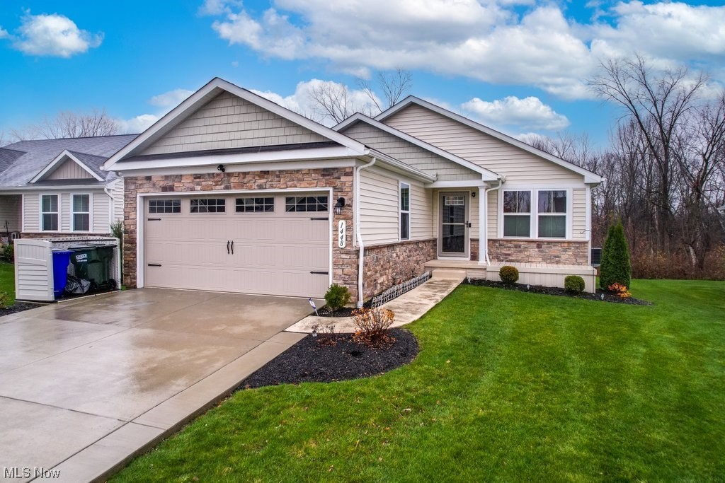 TURN KEY & ready for immediate occupancy! Only 4 Years young, 2BD/2.5BA dream Ranch home in the Villas of Meadow View! Located conveniently between Kent & Streetsboro off of RT43 & minutes from I480 & Ohio Turnpike. As you step inside, you’re greeted by the warmth of the open floor plan w/freshly painted neutral tones (2023) & LVP flooring throughout. The heart of the home is the gourmet kitchen, boasting stainless steel appliances, granite counters, tile back splash, instant hot water, pull-out drawers & island w/seating for entertaining family and friends. Off the kitchen is the family room w/custom insulated blinds & a slider leading to the Endeck deck (2022) w/motorized SunSetter retractable awning overlooking a private wooded area. Bonus room could be used for dining or an office. The primary suite features a large walk-in closet & en-suite bath w/walk-in shower. The 2nd BR has access to a full bathroom, providing comfort & ease for guests. Enjoy the convenience of 1st floor laundry complete w/washer/dryer. The partially finished full basement w/ample storage is perfect for a home gym, rec room area, or a home office. The basement also features a 1/2 bath plumbed for shower. Other features include lawn sprinkler system (2023), alarm system, Nest thermostat, Ring doorbell, 2 car garage, widened driveway (2021), & floating deck on front porch. Aurora Farms Outlets & Hudson’s First & Main nearby. Be in your new home by the holidays! Schedule a private showing today!