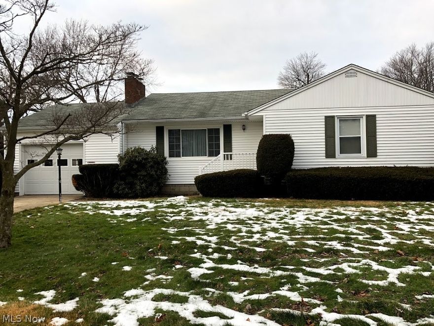 Lovely well cared for,  move-in ready ranch style home with many amenities!   Large eat-in kitchen with ceramic tile floor and lovely updated oak cabinets provide lots of storage for all your needs.  Separate dining room with a large picture window.   Spacious living room with brick fireplace.  Two bedrooms with large closets. Bathroom with large walk-in shower and laundry shoot. Lots of storage space in all the rooms!  Extended living space in the high, full, partially finished basement with laundry and work areas.  Very large room in basement with brick fireplace could easily be partitioned off into separate rooms to fit your needs.  Additional full bath in the basement.  Newer vinyl windows throughout.  Gas furnace with air conditioning. Attached garage and concrete patio for entertaining. All this on a double corner lot!