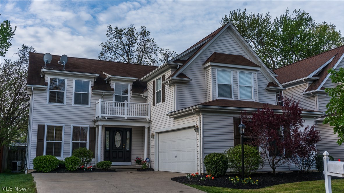 Welcome home to this stunning, move-in ready, Bennett built, four bedroom 2.5 bath colonial! Located on a trendy, newer street in West Park, within the city limits of Cleveland! Freshly painted interior with neutral decor and lots of natural light! The front porch invites you to a beautiful marble entry. The two-story living room is open to the formal dining room with hardwood floors. This home features 2,651 sq. ft PLUS a full-finished basement which includes additional living space and a rough in for full bath! The 1st floor boasts a spacious family room with fireplace and a French door that opens to a large, stamped concrete patio. Upgraded maple cabinets fill this large custom kitchen featuring an island and stainless appliances including a newer stove. The second floor loft with hardwood floor, leads to the spacious master suite with vaulted ceiling, walk-in closet and master bath. Three additional bedrooms and 2nd full bath complete the second floor. This home is tucked away on