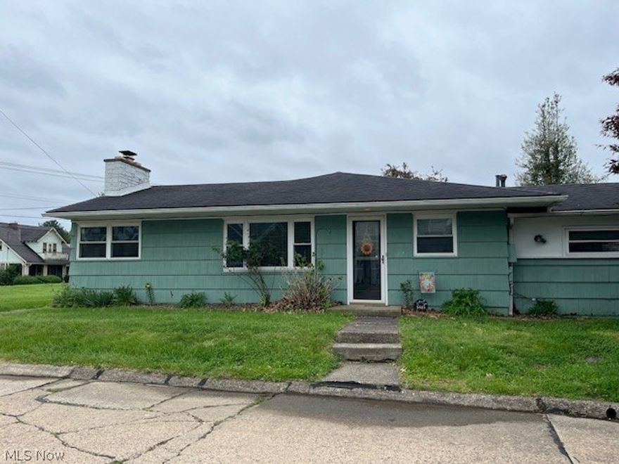 Complete one story living, 3 bedrooms, 2.5 baths, lovely living room/ dining with fireplace - 1 car garage, corner lot and 1/2, easy access to bus line, close to Grand Central Mall, close to groceries, drug stores, etc. Greenmont Elementary is within walking distance. One floor charmer! The price is right.