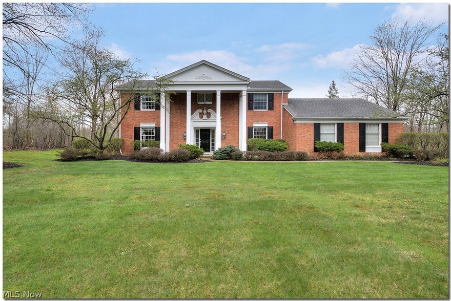 Beautiful brick traditional colonial with fabulous curb appeal......a Shaker home in the Orange school system.  The present owners have lived here and lovingly maintained/updated this fine home since 1975.  Some newer enhancements include roof (2005) with 50 year shingles, new driveway (2016), second floor bathrooms redone (2016), kitchen with granite and first floor bath (2013), invisible fence, garage door (2017), hot water tank (2017), some newer windows, and much more.  Extensive landscape done in past 2 years.