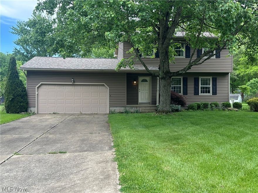 Look at his Beauty in the Heart of Boardman!! This Home features 3 Bedrooms and 2.5 Baths with an Open Floor Plan. Remolded Kitchen with Granite Countertops that opens up to the Large Living room and Dining Room with Hardwood Floors. French Doors lead into the Step-Down family Room with Fireplace, that has Sliding Glass Doors which lead out to the Patio! 3 Bedrooms upstairs with a Spacious Master Bedroom! Partially Finished Basement and large Backyard!! Please call for your Private Tour!!