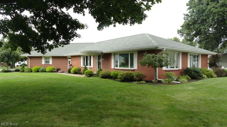 Spacious 3-4 bedroom, 3 bath brick ranch.  Breakfast bar in the kitchen.  Enclosed breezeway leads tot he vinyl deck.  Master bedroom includes a full bath which was remodeled in 2008.  Guest bath remodeled in 2008.  Finished basement includes a rec room with wet bar, a bedroom with walk in closet, exercise room, laundry room and full bath.  Updates throughout include new carpet, new roof in 2010, new hot water heater in 2012.  Nicely landscaped in 2008.  Vinyl fence enclosed backyard.  Nice, level corner lot.  Current owner's gas budget is $59 monthly.