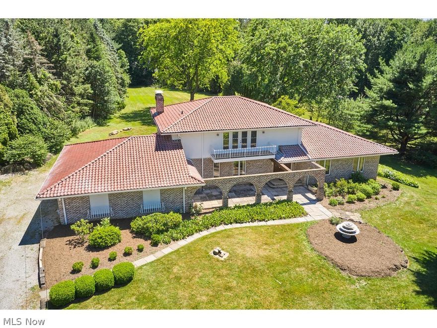 This 3 Bedroom, 3.5 bath home w/walkout lower level is situated on 1.72 private acres in the Rolling Retreat neighborhood in Bath Township. Revere Schools.
The kitchen is the center of the home and features a Viking Refrigerator, double ovens, and granite countertops. Kitchen opens to the family room w/fireplace and French doors to a beautiful brick patio w/large, flat backyard. Don't miss the front stone patio w/brick arches! Living room, office, formal dining room, laundry room & 1 full bath complete the main level. 2nd floor features owner's suite w/private balcony and newly renovated owner's bath plus 2 additional bedrooms & 1 full bath. Walkout Lower Level features a large rec room, other finished space & half bath. 3-car garage.