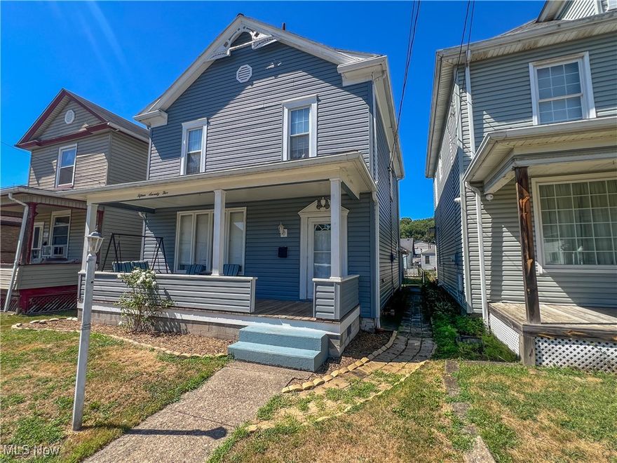 Very nice 3-bedroom 2-full bathroom home with a detached garage and a fenced-in yard! The exterior of the home was upgraded to vinyl siding. Outside the home offers a recently renovated front porch, fenced-in backyard, rear concrete patio, detached garage, and private driveway. The foyer has ceramic tile flooring and a beautiful staircase. The ceramic tile runs through the eat-in kitchen, first-floor full bathroom, and the laundry/mud room. The living room features a stone fireplace and hardwood flooring. The living room flows into the dining room and is open to the kitchen. Upstairs, the home has three bedrooms and a full bathroom. The full bathroom was remodeled with ceramic tile, vanity, toilet, tub/shower, and fixtures. The home sits on a full basement for all your storage needs.