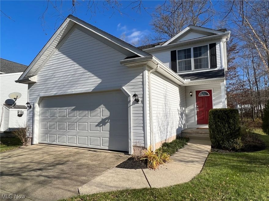 Warm and Inviting 3 Bedroom & 2.5 Bath Colonial in the Woods of Burlington! Foyer entrance welcomes you into the spacious Living Room with gas stone fireplace. The Eat-in Kitchen has been beautifully updated with new granite counters & light fixtures, breakfast bar, stainless steel appliances, hardwood floors through to dining area with sliders to brick patio. Second floor includes Master Bedroom with walk-in closet & Master Bath with granite vanity & skylight. 2 additional bedrooms with full updated bath to share. 1st floor Laundry Room, washer & dryer stay. You can easily finish the full basement for additional living space with plenty of room for storage. Many rooms have been freshly painted with neutral decor. Newer Gas Furnace 2020, Central Air 2021 & HWT. 2+car attached garage & double wide extended concrete driveway. Nicely landscaped with private wooded backyard. Community includes walking trails, playground, pavilion and just minutes to schools, shopping, hospitals, golfing, Chardon Square and Geauga Parks Maple Highlands trail!