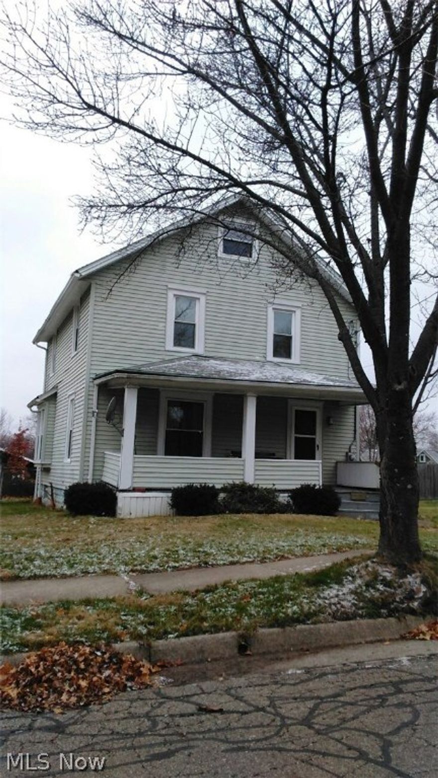 This large colonial home has 3-4 bedrooms, sits on a double lot, has a 2 car garage, updated kitchen, vinyl windows, newer furnace. First floor full bath with shower. Finished attic, foyer with built-ins, bonus room in back. Very large living room or living room/dining room combo. Call for your showing today!