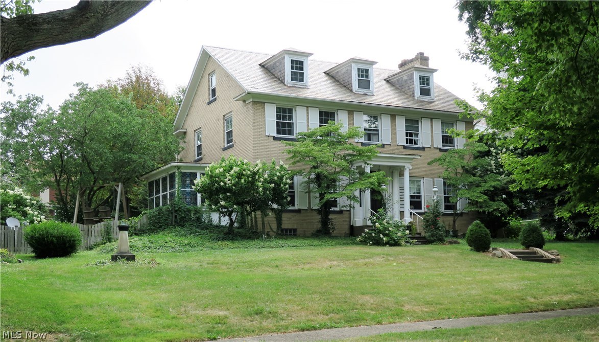 Welcome to Massillon's scenic, Historic 4th Street District! If you have EVER wanted to own a piece of Stark County's collection of historic landmarks, this is your opportunity!!! This nearly 3,000 sq. ft beauty is a past "Award-Winning" home! It reflects charm, character and elegance on a corner lot, while boasting its Maid's and Butler's Quarters from yesteryear! As you enter the foyer, you have the elegance of the formal dining room to your left and the wooden, architectural charm of the living room to your right. The kitchen, with its dual-pantry areas features both, the historic and modern eras! The turn-of-the-century staircase leads up to the spacious master bedroom with en-suite and large walk-in closet with a full wall of built-in drawer storage! Two other large bedrooms and a full bath also grace the 2nd floor. The 3rd floor hosts yet another large bedroom and full bath! The lower level of the home is where you'll find a large family, recreation or media room! This home featu