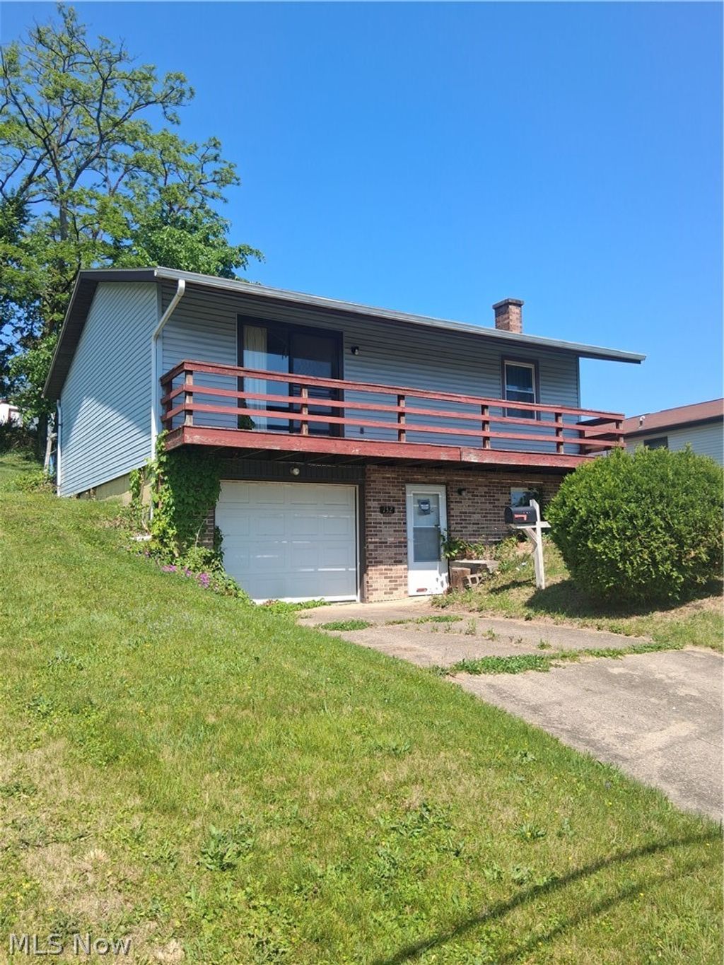 Photo of 132 W Highland Avenue, Barnesville, OH 43713 (MLS # 5211041)