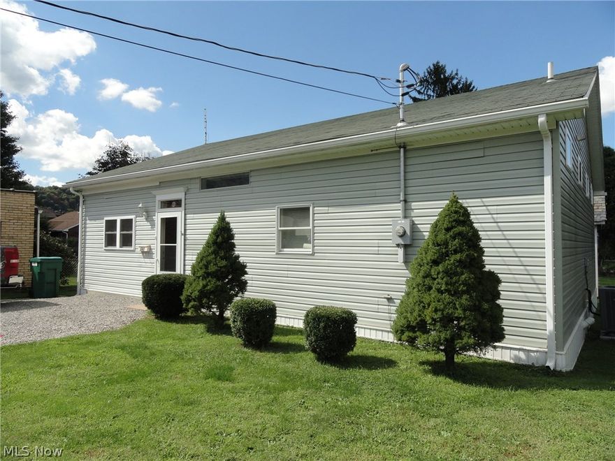 3 BR/1 full bath Ranch house on level lot w/back deck & detached garage.  House was finished in 2011, roof updated after 2015 hail storm.  House features High ceilings, newer vinyl siding,  windows & doors.  Garden area in back yard. Heat pump.