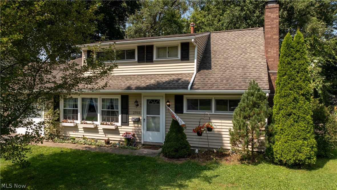Welcome to 2960 Archwood Place in the highly sought area of Cuyahoga Falls OH which is a perfect size home with tons of curb appeal. Not too big and not too small, still room to move and spread out. When you initially walk into the large living room with beautiful wood floors you will notice the 3 newer windows that fill the room with natural sunlight. The eat-in kitchen is the perfect size for the family to gather around to cook, eat & visit one another. There's also plenty of cabinet space for everything you need & furniture bar piece that Seller is leaving for the buyer since it is very useful & pretty. There are 3 bedrooms with two of the bedrooms are located on the first floor so easy to have ranch one floor living with 2nd floor bonus bedroom or use as a home office with 2 closthes closets! Also, the bonus feature in one of the 1st floor bedrooms is an awesome fireplace to keep you cozy on those cold winter nights and enjoy the ambiabce! Current Seller uses as a TV Room and readi