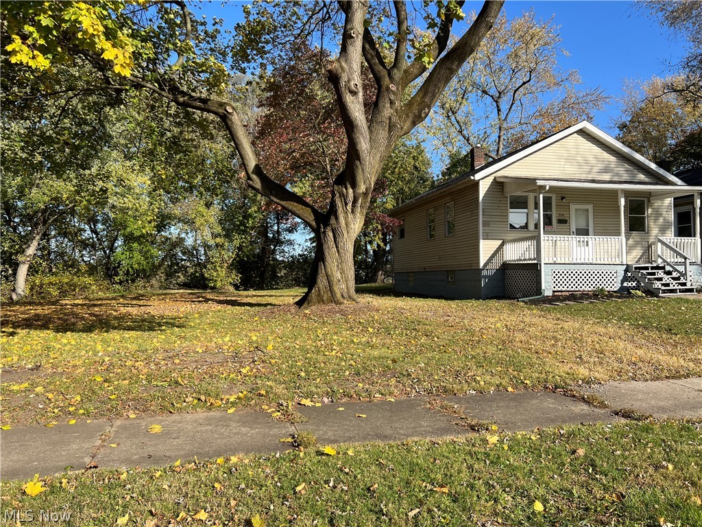 Move-in Ready! Cute west side Massillon house with wooded view in backyard. Freshly painted with new flooring throughout. Living room, large dining area and kitchen with new cabinets, countertops and fixtures. 2 bedrooms and full bathroom. Full basement with Laundry hookups.