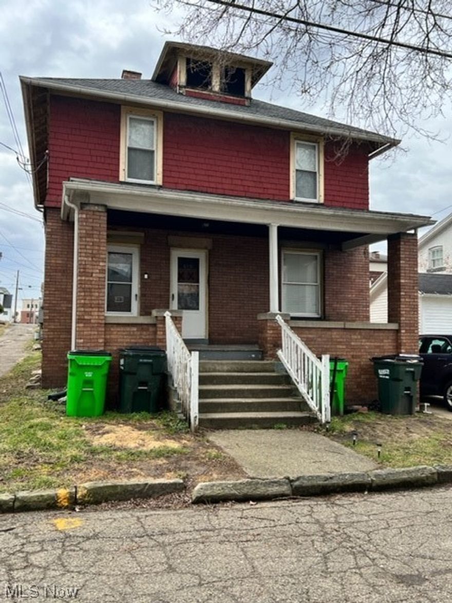 Attention Investors!  Up and down brick/wood sided duplex fully occupied with one tenant month to month and one tenant on a lease until end of year.  Rents are below market rate currently.  Tenants take good care of the units.  Units are spacious.  Full basement.  Tenants pay gas and electric.  On street parking.
