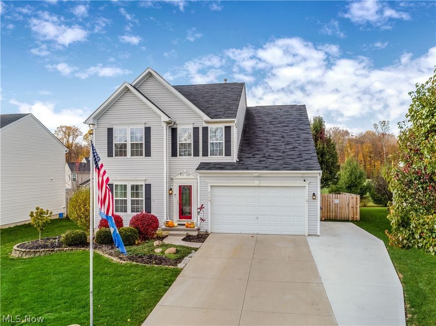 Welcome to this stunning colonial located in desirable Wadsworth locale.  This home boasts 9 foot ceilings and a very open floor plan.  There is an inviting great room with a gas fireplace.  The kitchen has been updated with beautiful white cabinetry with under cabinet lighting, granite counter tops, stainless steel appliances, and hardwood flooring.   There is an inviting morning room with french doors that exit to your back deck and fully fenced back yard perfect for pets.  All 4 bedrooms are spacious situated on the 2nd level.  The master bedroom has vaulted ceilings, a walk in closet, and a private and updated master bathroom.  The basement is fully finished as well with a recreation room in addition to an office and full bathroom.  Great home!  Fabulous location.  Call to schedule a showing today.  This is the one!!