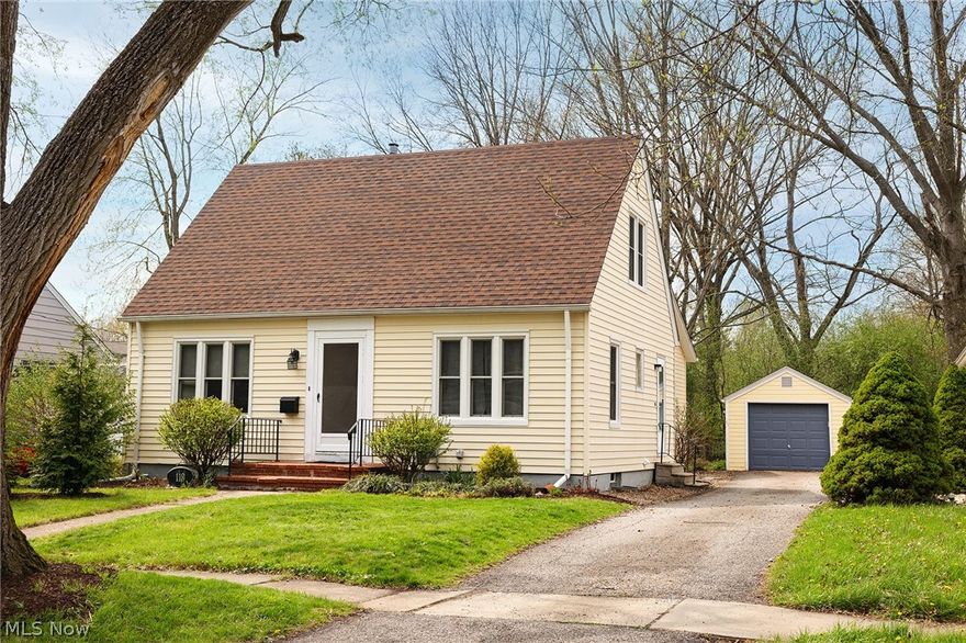 Single-family buyers and those seeking multi-generational living, look no further! This fantastic opportunity in the heart of Oberlin offers a spacious 4-bedroom, 2.5-bath Cape Cod designed with flexibility and comfort in mind. Added in 2013, the thoughtfully designed in-law suite includes a second first-floor bedroom, an ensuite bath, and a huge family room. A breezeway was also added, creating a private entrance to the suite, along with sliding doors that lead to a small private deck off the side of the home. The suite also features its own separate rear entrance, making it ideal for extended family, guests, or private living arrangements. Upon entering the home, you’re welcomed by a large, inviting living room to the left, featuring a beautiful Valor gas fireplace—perfect for cozy evenings at home. Natural light pours through the many windows throughout the space, all updated in 2015 with quality Andersen windows. The updated kitchen offers Corian countertops, an abundance of beautiful maple cabinetry, and a convenient coffee/beverage bar station. Newer appliances complete the space, including a Bosch dishwasher, making the kitchen both functional and stylish for everyday living and entertaining. A convenient first-floor bedroom and half bath complete the main level. Upstairs, you’ll find two spacious bedrooms featuring built-in drawers and deep closets that provide excellent storage. An updated full bath serves the second floor, offering both comfort and functionality. Private, treed, partially fenced backyard! Updates include: Professional landscaping, Roof (2019); Windows (Original home 2015); Kitchen (2011); Addition (2013); Waterproofed basement (2005).