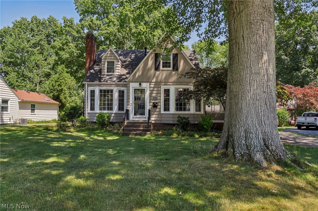 Welcome to this charming 3 bedroom, 2 full bath Cape Cod style home, where classic design meets modern updates. The beautiful entry welcomes you into the living room with fireplace and gorgeous bay window. The heart of the home is a completely updated kitchen, seamlessly flowing into a cozy eat-in area and a delightful 3-season room, perfect for relaxation throughout the year. The main floor boasts two spacious bedrooms and a full bath, providing convenient living options. Ascend to the upper level to discover a stunning primary suite, complete with a luxurious full bathroom and an expansive closet, offering a private retreat. The finished basement features a versatile rec room, ideal for entertainment or a home office, and a dedicated laundry area for added convenience. Step outside to the large fenced-in lot, perfect for outdoor activities and gatherings. The detached 2-car garage offers ample storage and parking space. This home is truly move-in ready, inviting you to enjoy its many features from day one. Don't miss the opportunity to make this beautifully updated Cape Cod your own!