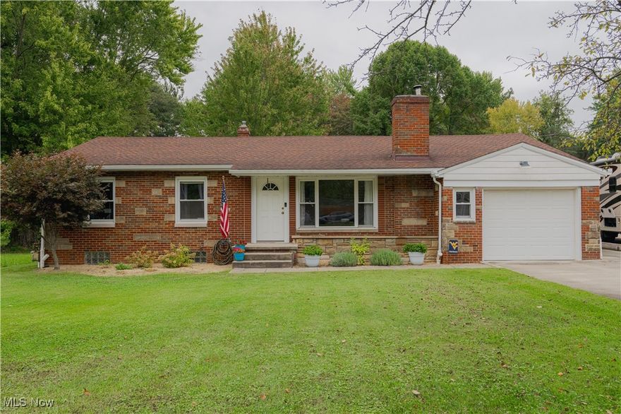 Welcome to this charming all brick ranch, nestled on a little over half an acre. This move in ready home is missing nothing, other than you! Pulling into the concrete driveway, you will appreciate that your new home sites further back from the road, with charming curb appeal. Entering in the front door is a treat! You are instantly greeted with an abundance of natural light, and warm wood floors that carry throughout most of the main floor. The living offers a wood burning fireplace/wood burning stove, perfect for the quick approaching fall and winter months. The formal dining room offers plenty of space for eating and entering. Adjacent to the fully remodeled kitchen, with granite countertops, newer cabinets and backsplash, along with stainless steel appliances. The kitchen offers plenty of counter and storage space, along with bar seating. All three bedrooms offer plush carpeting, are generously sized, and have plenty of closet space. The lower level is partially finished with carpeting and glass block windows. Half bathroom conveniently on lower level. Off the dinging room is a sliding glass door leading to a deck, and a lower concrete patio! 14x22 shed in rear of lot, does have electric and workshop area. Additional storage shed also. Updates include but not limited to Furnace and AC (2023), Hot Water Tank (2017), Dishwasher (2025) Bathroom, Smart doorbell and thermostat, some flooring and paint, and more! This home is conveniently located close to the highway access, shopping, Mud Run Golf Course, and more! Do not miss your opportunity to call this beautiful home, yours! Come see it for yourself!