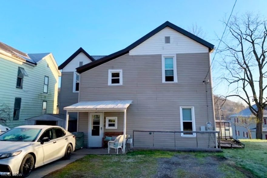 Large 4 bedroom, 2 bathroom home with spacious rooms and 10' ceilings on a dead end road.   New gutters, downspouts, soffit and facia (2022) with a transferable lifetime warranty.  All new windows and screens (2020) throughout the home also with transferable lifetime warranty.  6ft wooden privacy fence constructed in 2020 surround the large back yard.    Both bathrooms completely remodeled in 2021 with full walk- shower with sliding glass door (downstairs) and full tub with shower (upstairs).  All stainless steel appliances in the kitchen and the washer and dryer stay.  
Home is minutes from State Route 7 and the local high school.
 Don't let this home slip out from under you.  Sellers are motivated.